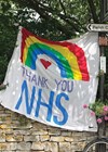 Photo showing NHS banner hanging on wall.