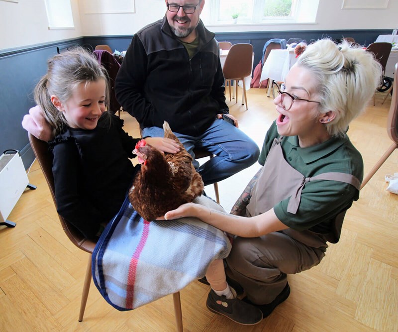 FOR-WEB-Amelie-with-chicken.jpg