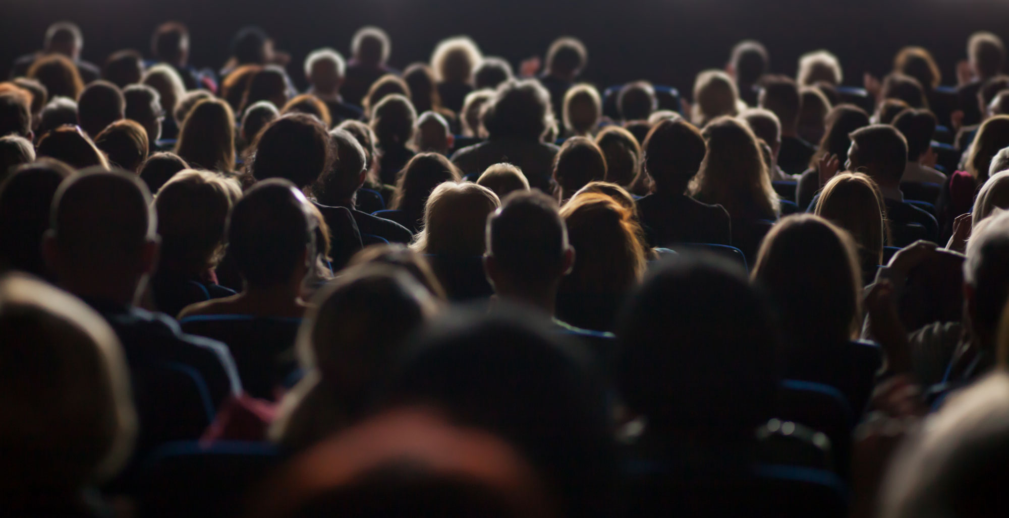 Photo of theatre audience.