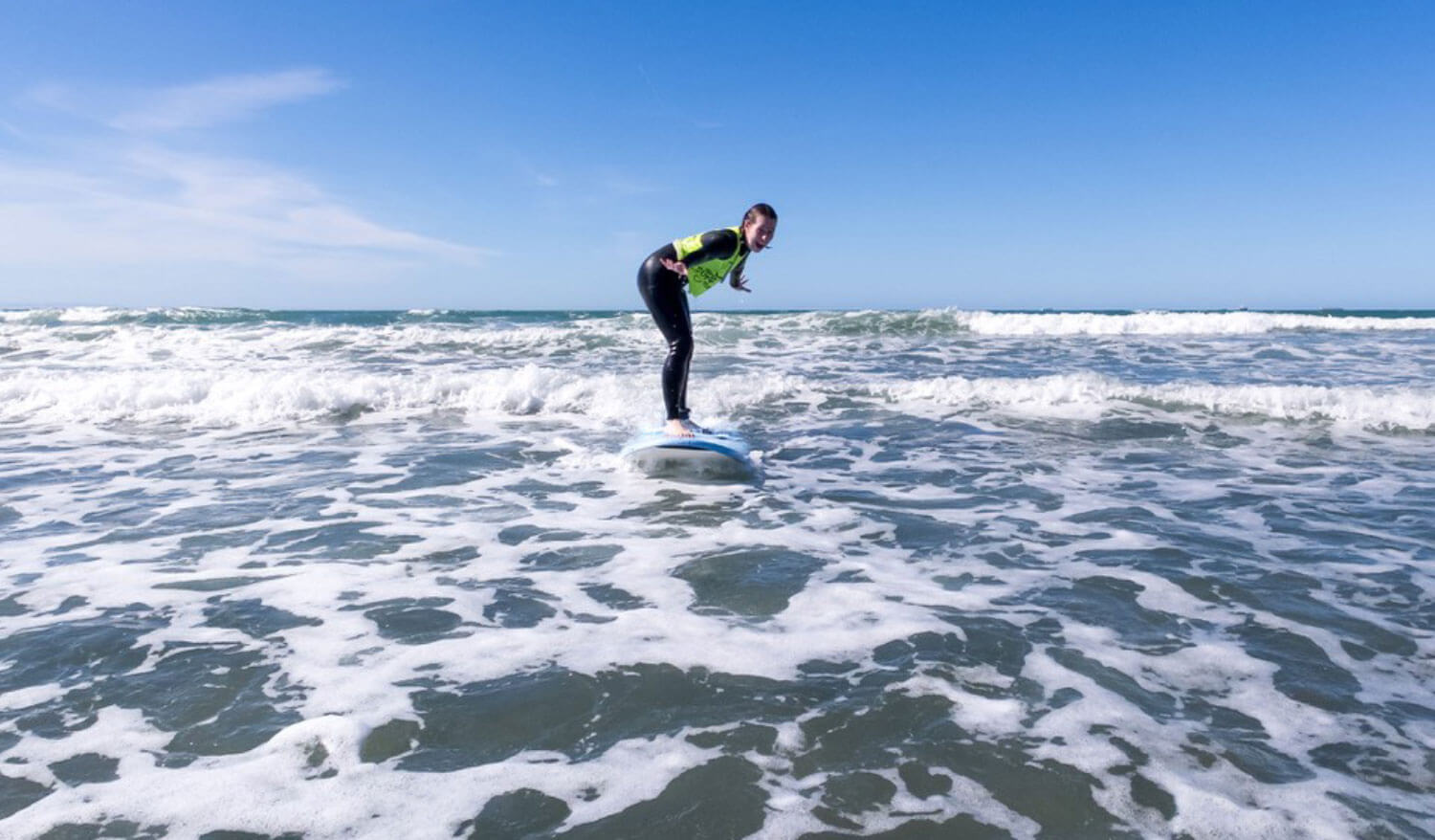Photo showing the author surfing.